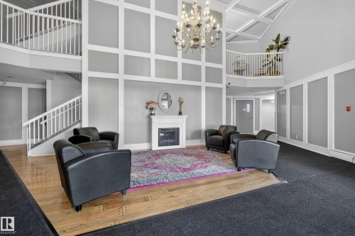 407 5125 Riverbend Road, Edmonton, AB - Indoor With Fireplace