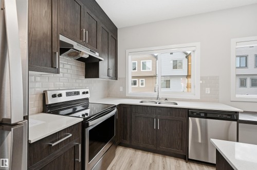 80 1010 Rabbit Hill Road, Edmonton, AB - Indoor Photo Showing Kitchen With Double Sink With Upgraded Kitchen