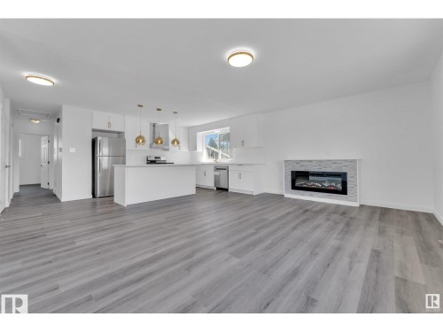 8004 130 Avenue, Edmonton, AB - Indoor Photo Showing Living Room With Fireplace
