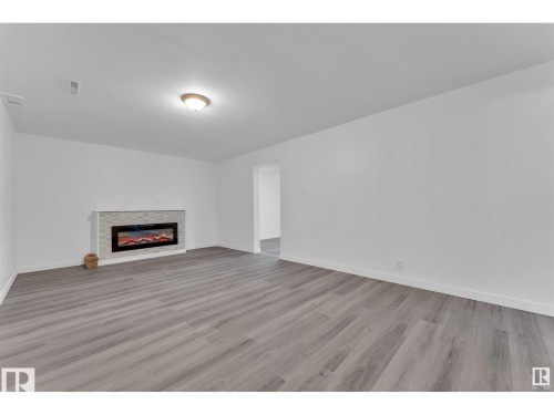 8004 130 Avenue, Edmonton, AB - Indoor With Fireplace