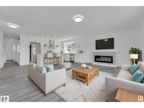 8004 130 Avenue, Edmonton, AB - Indoor Photo Showing Living Room With Fireplace
