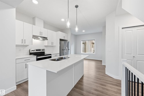 38 1010 Rabbit Hill Road, Edmonton, AB - Indoor Photo Showing Kitchen With Double Sink With Upgraded Kitchen