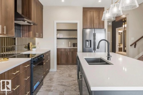 22725 89A Avenue, Edmonton, AB - Indoor Photo Showing Kitchen With Double Sink With Upgraded Kitchen