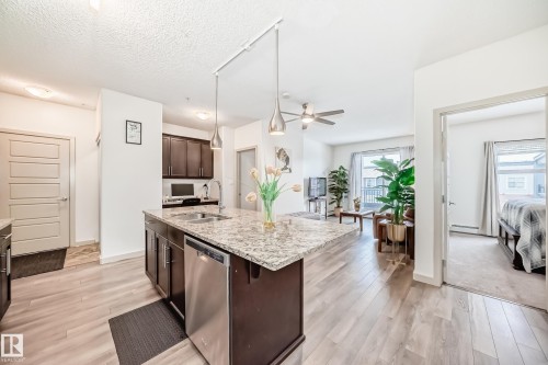 406 504 Griesbach Parade, Edmonton, AB - Indoor Photo Showing Kitchen With Double Sink