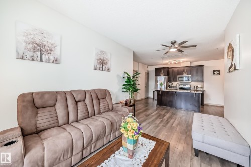 406 504 Griesbach Parade, Edmonton, AB - Indoor Photo Showing Living Room