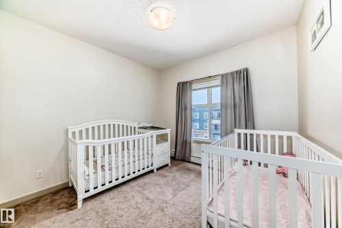 406 504 Griesbach Parade, Edmonton, AB - Indoor Photo Showing Bedroom