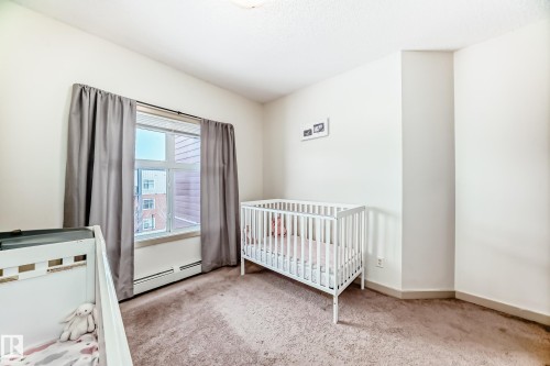 406 504 Griesbach Parade, Edmonton, AB - Indoor Photo Showing Bedroom