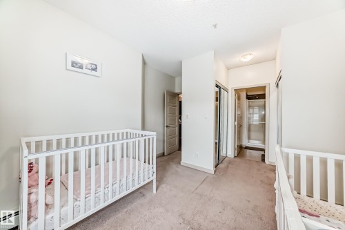 406 504 Griesbach Parade, Edmonton, AB - Indoor Photo Showing Bedroom