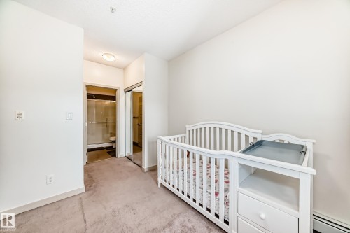 406 504 Griesbach Parade, Edmonton, AB - Indoor Photo Showing Bedroom