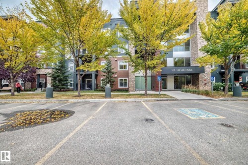 Summer photo - 406 504 Griesbach Parade, Edmonton, AB - Outdoor With Facade