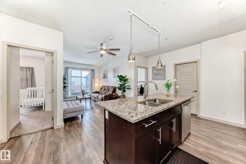 406 504 Griesbach Parade, Edmonton, AB - Indoor Photo Showing Kitchen With Double Sink