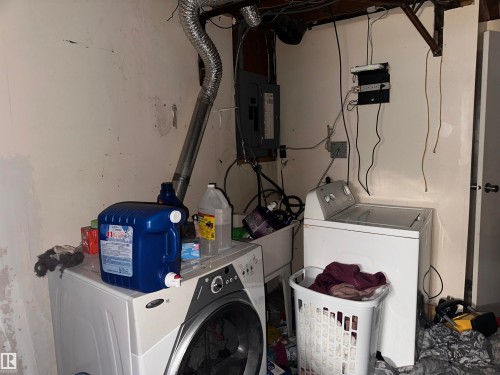 Laundry area equipped with washing machine and dryer hookups - 9724 102 Avenue, Westlock, AB - Indoor Photo Showing Laundry Room