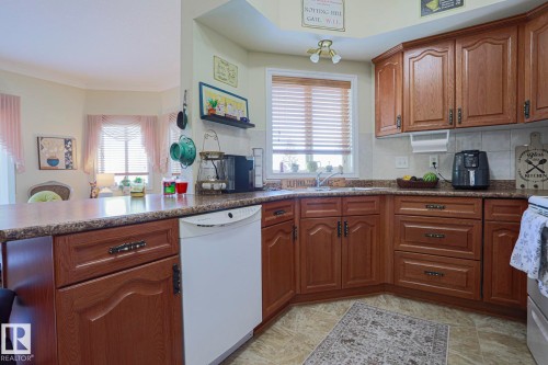 314 8528 82 Avenue, Edmonton, AB - Indoor Photo Showing Kitchen With Double Sink