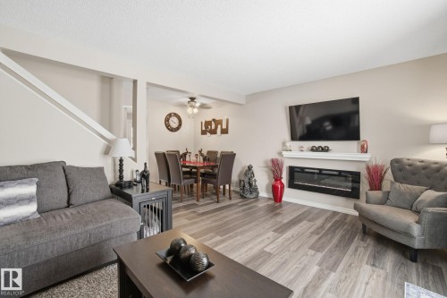 150 Woodborough Way, Edmonton, AB - Indoor Photo Showing Living Room With Fireplace