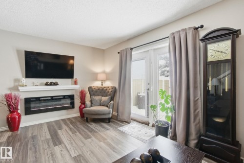 150 Woodborough Way, Edmonton, AB - Indoor Photo Showing Living Room With Fireplace