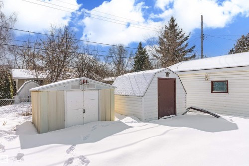 The property includes two outdoor storage sheds, providing practical storage solutions - 11 Sonora Drive, St. Albert, AB - Outdoor With Exterior