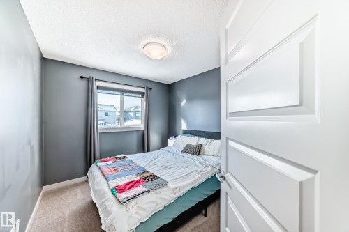 Bedroom #2 - 259 Robinson Drive, Leduc, AB - Indoor Photo Showing Bedroom