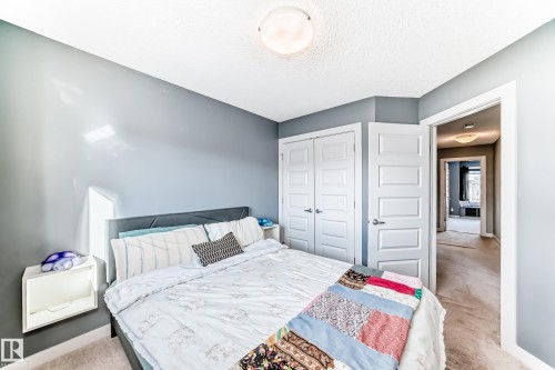 Bedroom #2 - 259 Robinson Drive, Leduc, AB - Indoor Photo Showing Bedroom