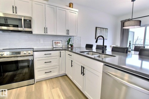 30 1910 Collip View, Edmonton, AB - Indoor Photo Showing Kitchen With Double Sink