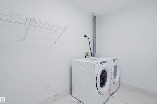 703 9919 105 Street, Edmonton, AB - Indoor Photo Showing Laundry Room