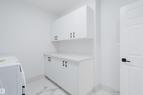 703 9919 105 Street, Edmonton, AB - Indoor Photo Showing Laundry Room