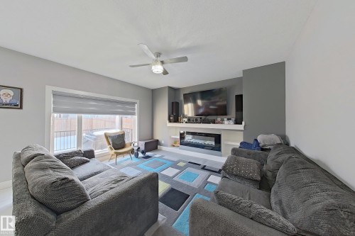 3107 13 Avenue, Edmonton, AB - Indoor Photo Showing Living Room With Fireplace