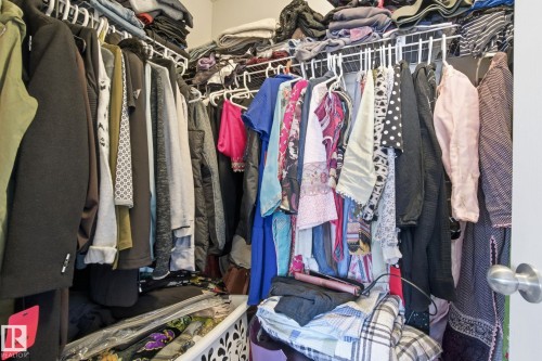 The property includes a closet with wire shelving and a metal door handle - 3026 16A Avenue, Edmonton, AB - Indoor With Storage