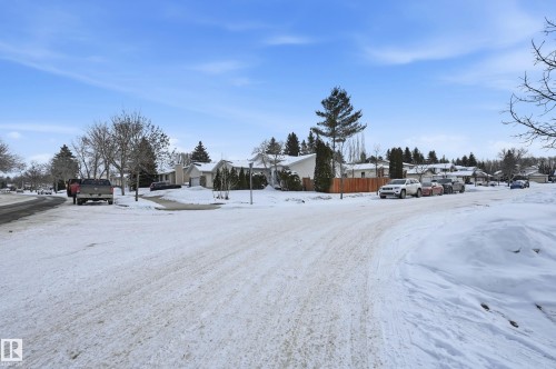 The property is situated in a neighbourhood with established trees and residential homes - 85 Arlington Drive, St. Albert, AB - Outdoor