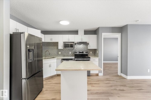 115 16221 95 Street, Edmonton, AB - Indoor Photo Showing Kitchen With Upgraded Kitchen
