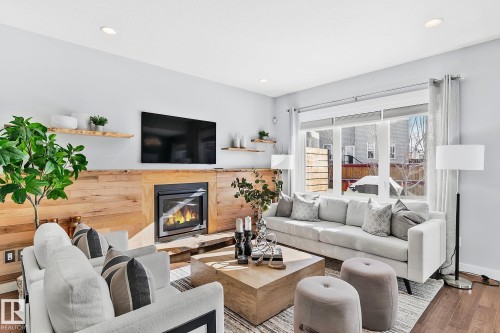 3721 Parker Crest, Edmonton, AB - Indoor Photo Showing Living Room With Fireplace