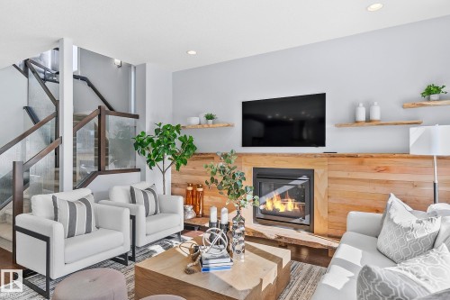 3721 Parker Crest, Edmonton, AB - Indoor Photo Showing Living Room With Fireplace
