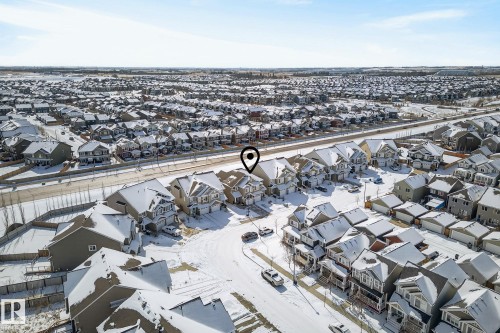 The property is situated in a well-developed neighbourhood featuring numerous detached homes with varied architectural styles and rooflines - 8225 24 Avenue, Edmonton, AB - Outdoor With View