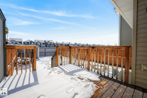 The property features a wooden deck and a fenced yard - 8225 24 Avenue, Edmonton, AB - Outdoor With Exterior