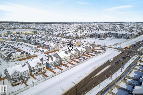 Aerial view showcasing the property within a residential district - 8225 24 Avenue, Edmonton, AB - Outdoor With View
