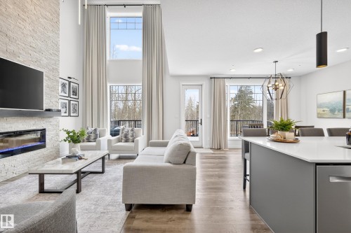 1663 Enright Way, Edmonton, AB - Indoor Photo Showing Living Room With Fireplace
