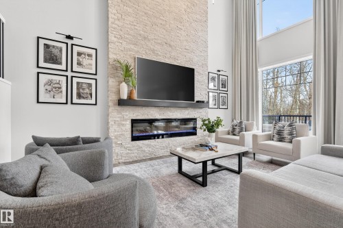 1663 Enright Way, Edmonton, AB - Indoor Photo Showing Living Room With Fireplace