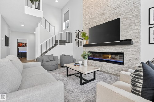 1663 Enright Way, Edmonton, AB - Indoor Photo Showing Living Room With Fireplace