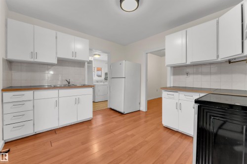 10657 64 Avenue, Edmonton, AB - Indoor Photo Showing Kitchen With Double Sink