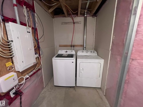 The property includes a water heater and a furnace, providing essential utilities - 1421 26 Avenue, Edmonton, AB - Indoor Photo Showing Laundry Room