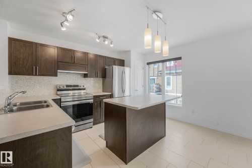 80 1623 Towne Centre Boulevard, Edmonton, AB - Indoor Photo Showing Kitchen With Stainless Steel Kitchen With Double Sink With Upgraded Kitchen