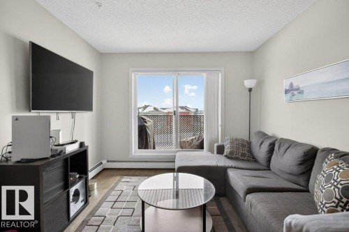 315 142 Ebbers Boulevard, Edmonton, AB - Indoor Photo Showing Living Room