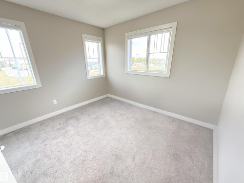 41 50 Mclaughlin Drive, Spruce Grove, AB - Indoor Photo Showing Other Room