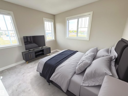 41 50 Mclaughlin Drive, Spruce Grove, AB - Indoor Photo Showing Bedroom