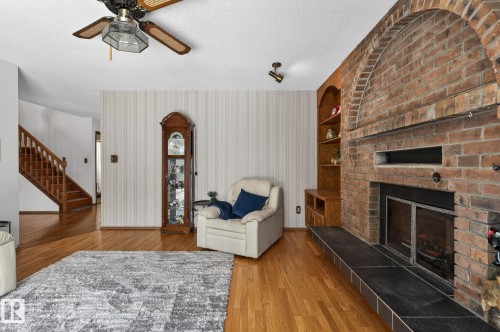 4720 147A Street, Edmonton, AB - Indoor Photo Showing Living Room With Fireplace