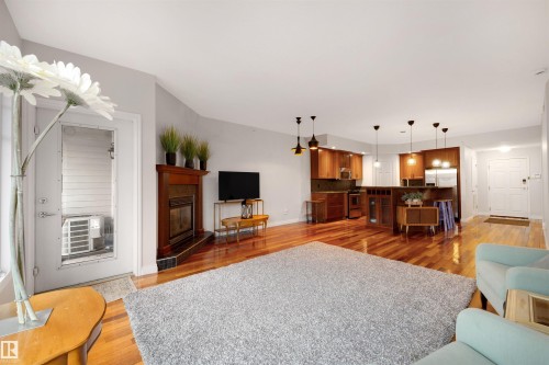 305 9803 96A Street, Edmonton, AB - Indoor Photo Showing Living Room