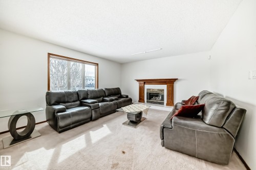 15404 132 Street, Edmonton, AB - Indoor Photo Showing Living Room With Fireplace