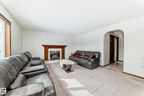 15404 132 Street, Edmonton, AB - Indoor Photo Showing Living Room With Fireplace