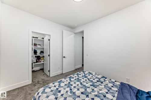 Bedroom featuring carpeted flooring and white walls - 15108 11 Street, Edmonton, AB - Indoor Photo Showing Bedroom