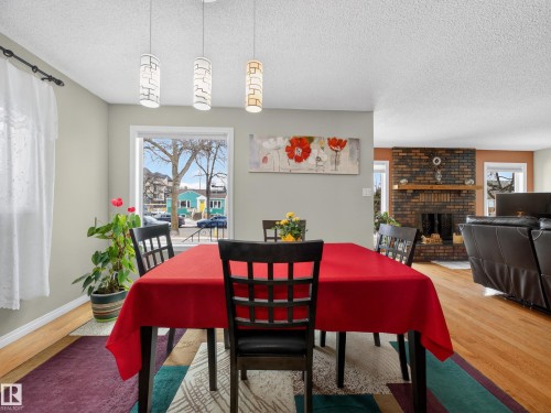 8906 83 Avenue, Edmonton, AB - Indoor Photo Showing Dining Room With Fireplace