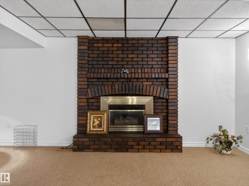 8906 83 Avenue, Edmonton, AB - Indoor With Fireplace
